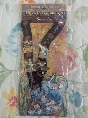 Disney pins. Disneyland Pirates of the Caribbean Black Lanyard with Pins